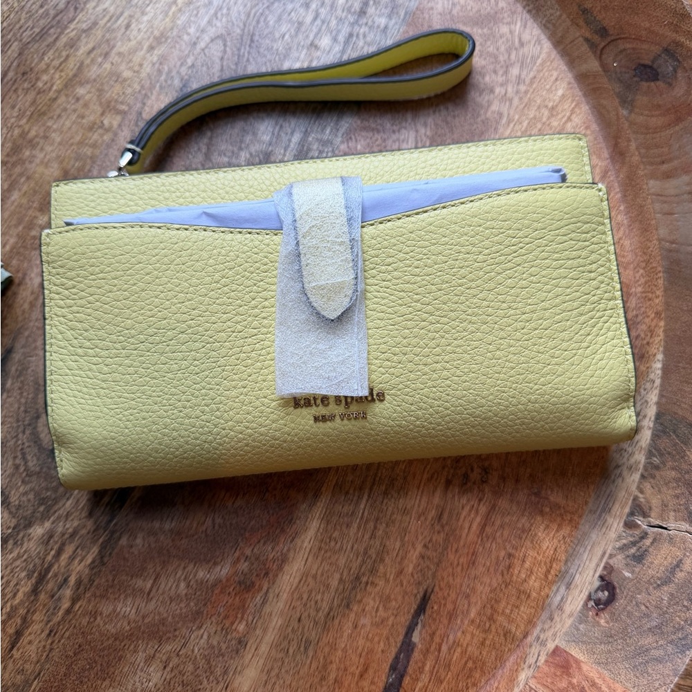 kate spade lemon yellow pebbled leather wristlet clutch